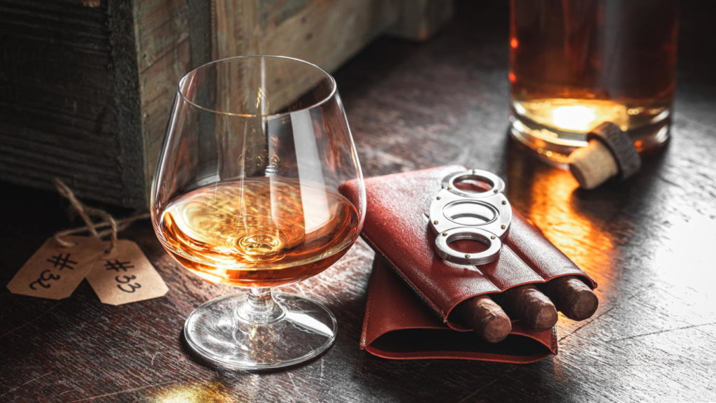 Hand crafted whisky and ccigar in the distillery warehouse